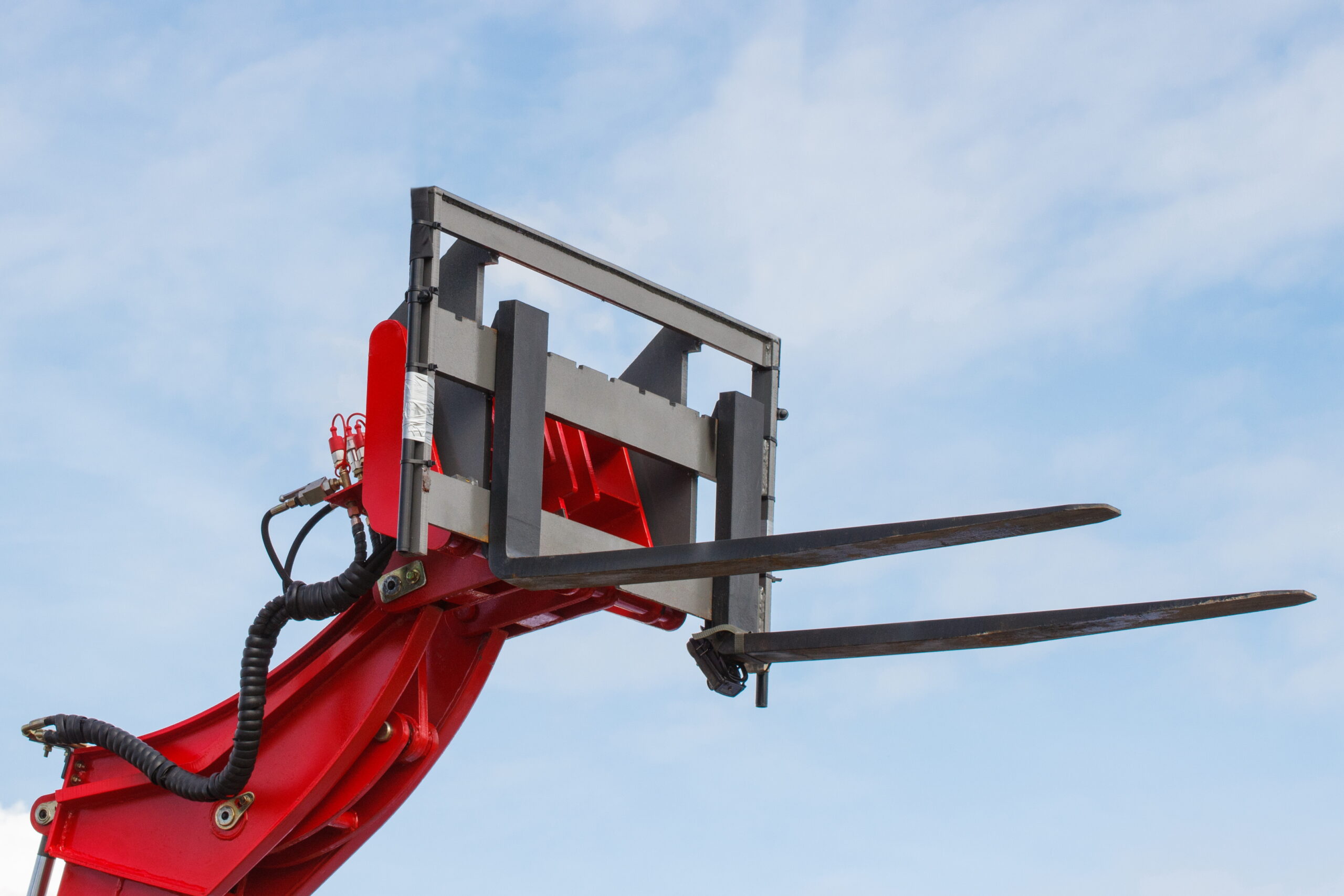 Forklift loader or stacker. Part of hydraulic mechanism using in industrial machine. Technology in transport